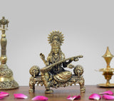 Brass Saraswati idol on singhasan with veena, 4-inch height, ornate detailing