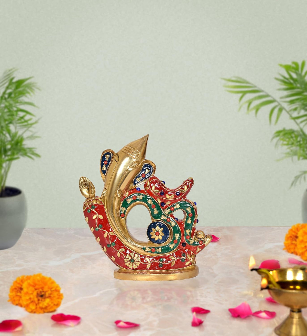 Brass Ganesha idol with red/green/blue enamel detailing, ornate base