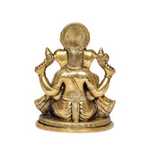 Gold-tone brass Ganesha idol statue, back view with circular halo detail, seated posture