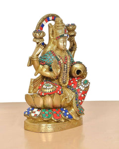 Brass Lakshmi idol with money pot and hand gestures, colorful enamel inlay