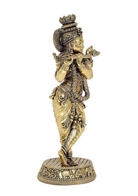 Back/side view of brass Lord Krishna figurine playing flute, ornate crown and ornaments
