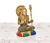 Brass Shiva figurine side angle, multicolor gemstone border and trident