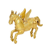 Gold brass winged flying horse statue with curled tail and engraved armor details