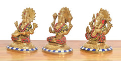 Three Ganesh idol views: front and angled poses on blue-striped round bases