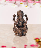 Copper Ganesha idol statue, seated, four arms, ornate crown, 2.75 in