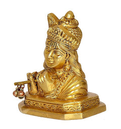 Idol Krishna temple statue, gold seated figure holding flute and bead ornaments, side view