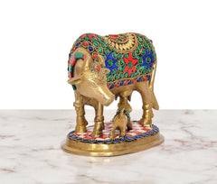 Brass cow with calf showpiece, multicolor enamel patterns, rear three-quarter view