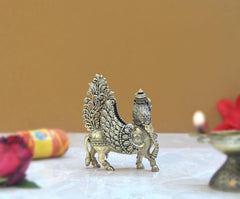 Brass Kamadhenu cow with wings, side/back view with detailed wing scrollwork