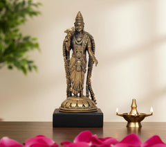 Gold-toned deity idol statue with lotus base, ornate jewelry and beaded arms, 5 inch