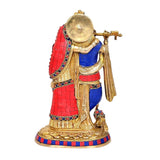Back view of brass Radha Krishna idol, red-blue garments with gold detailing