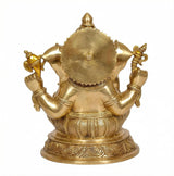 Brass golden Ganesha murti back view, textured waist details and round base