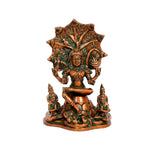 Brass Dakshinamurti Shiva statue, orange and green seated with tree-like back