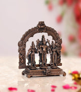 Copper Vishnu Shridevi and Bhudevi statue, front three figures under carved arch frame
