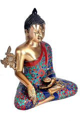 Buddha in Bhumisparsha pose, brass figure with floral robe and raised right hand