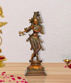 Standing brass Lord Krishna statue playing flute, colorful detailing on base