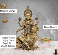 Lakshmi statue, brass-finish, 10 inch height; detailed jewelry and lotus base