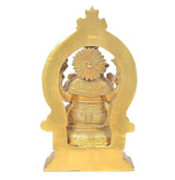 Brass Saraswati statue from behind with halo arch, detailed patterned robe