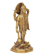 Brass standing Vishnu statue three-quarter view, four arms holding symbols