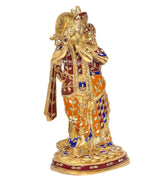 Brass Radha-Krishna standing idol, maroon and orange robe with blue accents, peacock flute