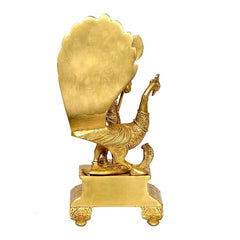 Brass Murugan-Kartikeya idol, rear view showing large fan-like halo and base