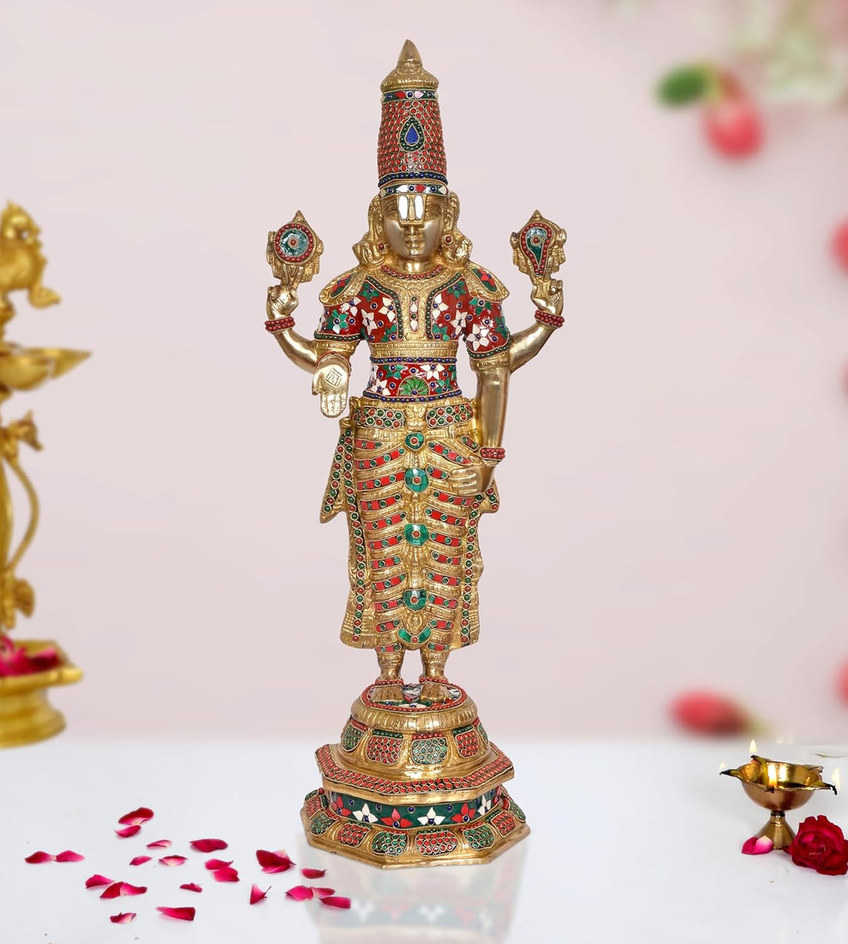 Brass Balaji idol statue with colorful patterned robe and four-armed pose