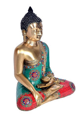 Brass Buddha statue, three-quarter view, Bhumisparsha mudra, teal and red patterned robe