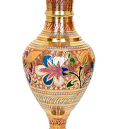 Close-up brass flower vase planter with colorful floral motif and engraved bands
