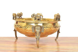Brass elephant urli with ghungroo, front view with elephants on rim and curved stand