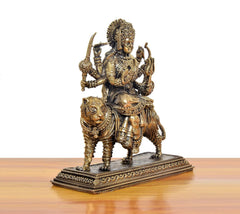 Bronze Durga Maa idol on tiger, angled view with detailed base and tiger head