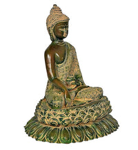 Brass Buddha statue seated on lotus base, gold robe details, green patina finish