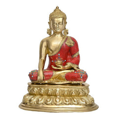 Brass Buddha statue, red robe with gold details, seated meditation pose on ornate base