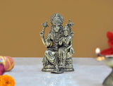 Brass Lakshmi Narasimha statue with raised arms and seated consort, 4 inch