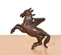 Brass flying horse with wings, side view, raised wing and engraved saddle