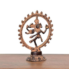 Brass Natraj Lord Shiva dancing statue, front view with detailed circular arch