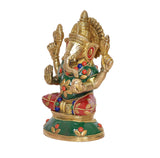 Side view brass Lord Ganesha idol, green and red attire with jeweled necklace