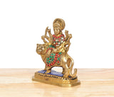 Side view: Brass Durga with lion statue, multicolor beaded patterns and curved tail