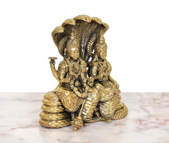 Front-left view of Maa Lakshmi & Vishnu brass idol on Sheshnag coils
