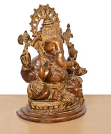 Brass Ganesha statue, brown, three-quarter view with detailed headpiece