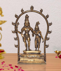 Brass Lord Shiva and Parvati standing mandir pooja showpiece with arched halo frame