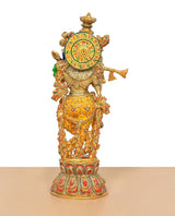 Back view brass Krishna idol with ornate circular shield and Meenakari trim