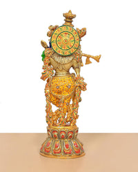 Back view brass Krishna idol with ornate circular shield and Meenakari trim