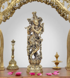 Brass Lord Krishna idol holding a flute, ornate standing figure on a pedestal, 10 inch