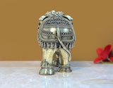Brass elephant figurine rear view, embossed patterned drape, 5 in tall
