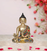 Brass meditating Buddha statue with multicolor jewel inlays and raised hand