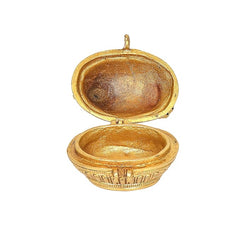 Open brass sindoor box with peacock base, inner tray revealed