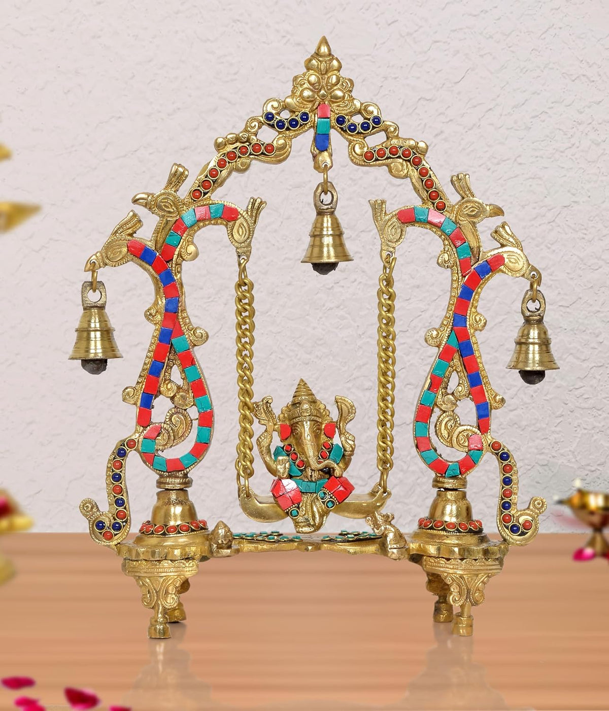 Brass Ganesha swing showpiece with colorful enamel arcs and hanging bells