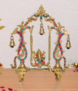 Brass Ganesha swing showpiece with colorful enamel arcs and hanging bells