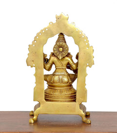 Rear view brass Saraswati goddess idol inside arched halo, detailed back