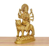 Brass Durga Maa idol on tiger base, angled view with ornate dress and hand-held trident