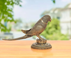 Brass parrot statue with intricate carved feathers and lotus base, 4.5 in tall